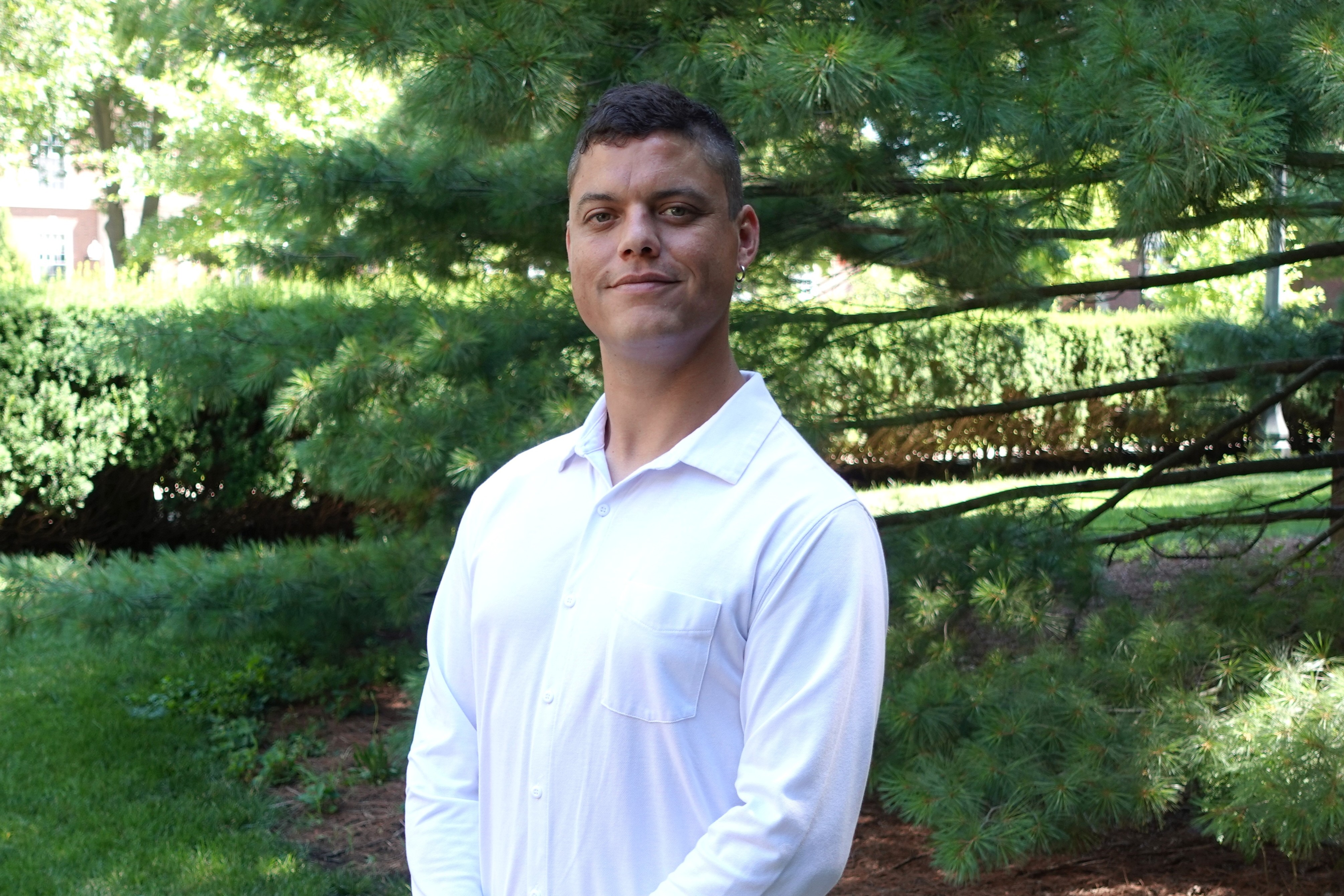 A professional headshot of Cristhian Molina